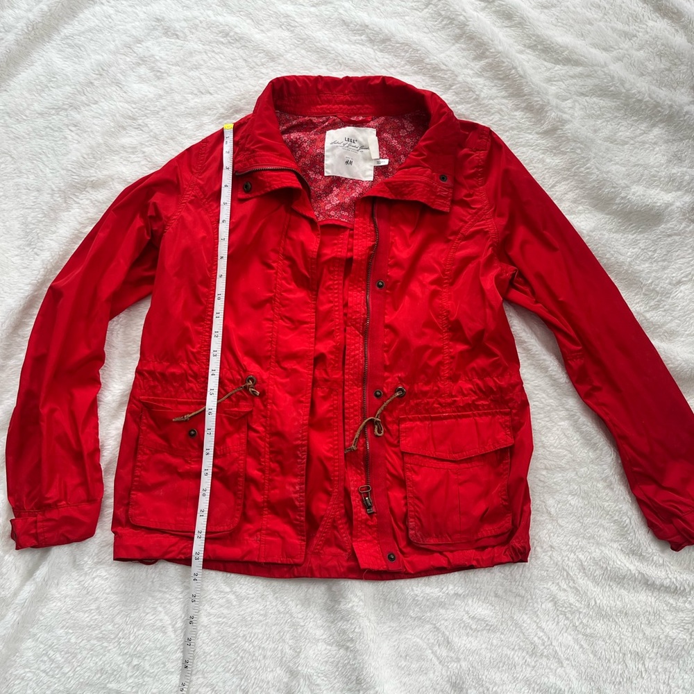 Women’s red older H&M rain coat